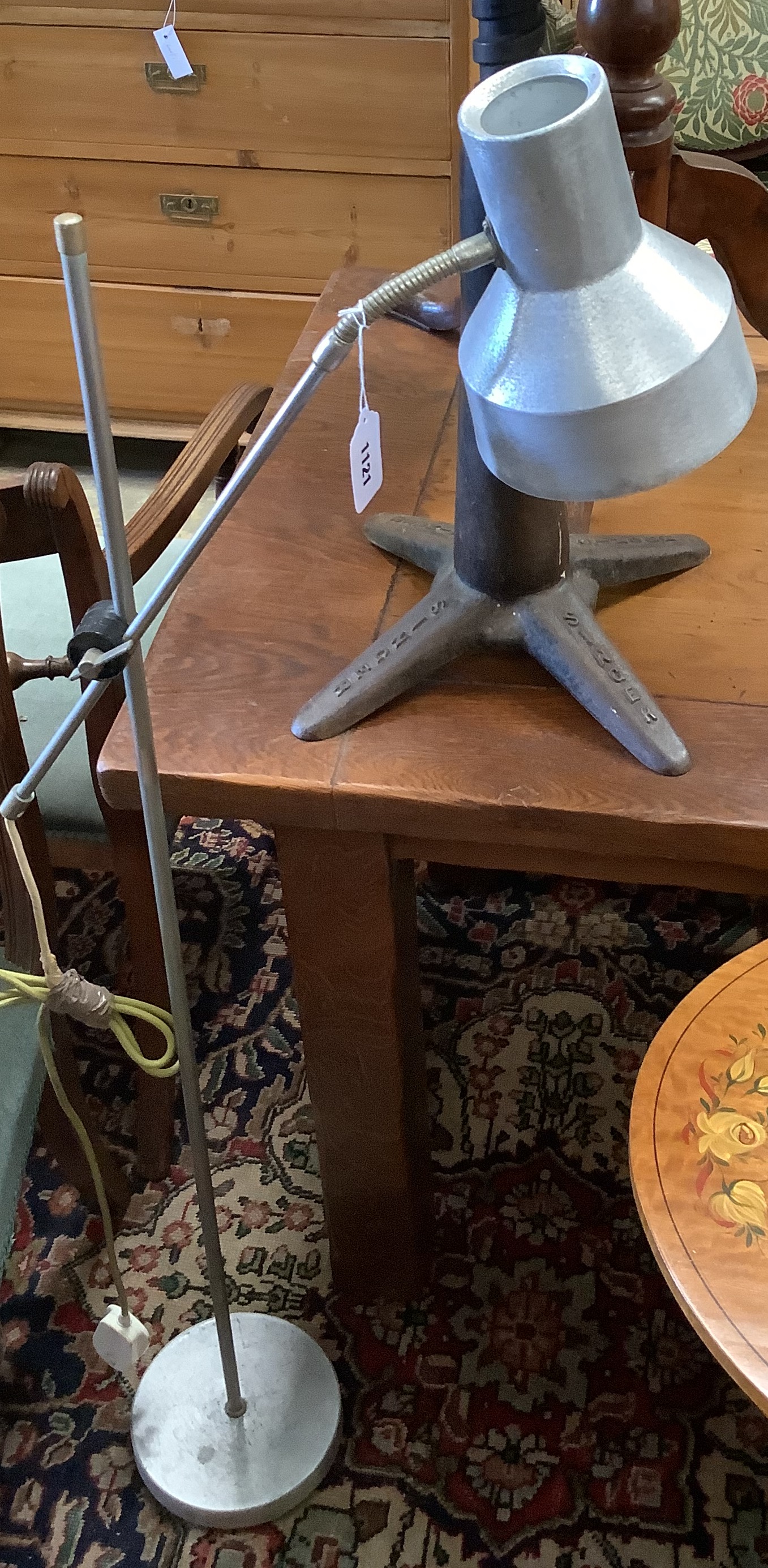 A vintage cast iron Singer stool and an industrial style floor lamp (2)